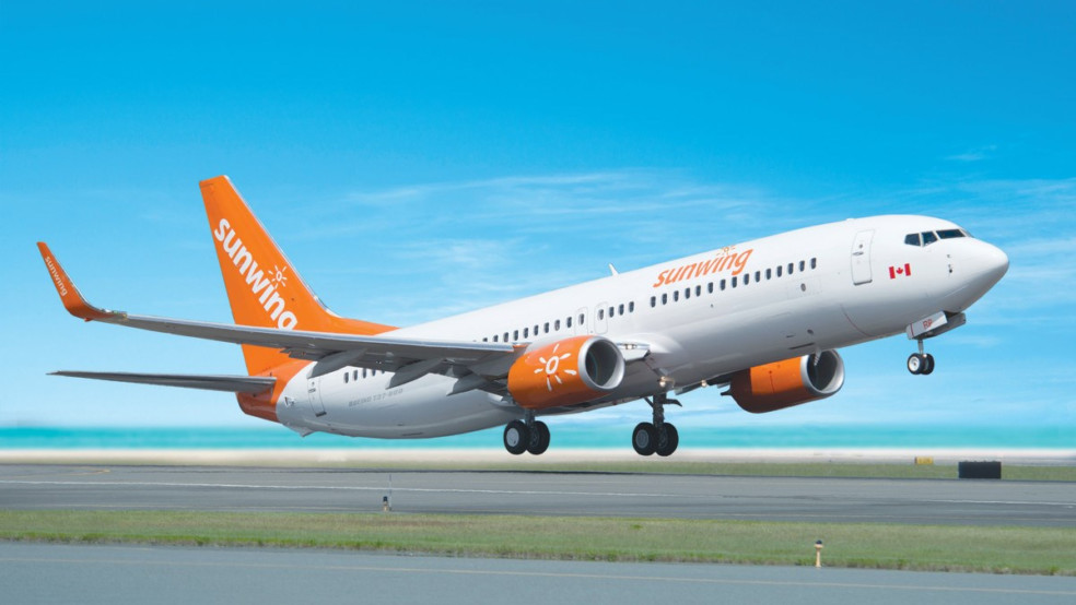 sunwing airlines aircraft taking off